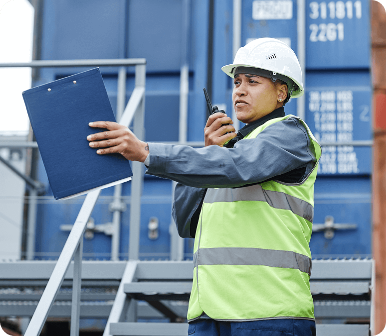 female foreman using a radio