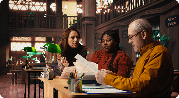 three people with papers on hand talking