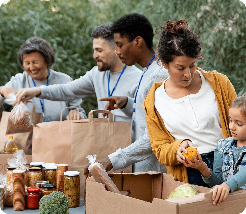 volunteers giving food donations