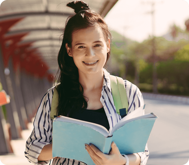 woman holding a book