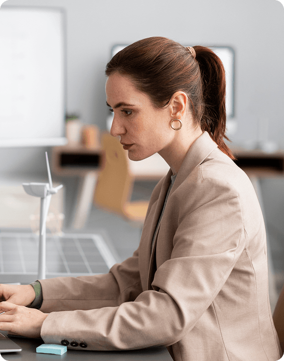 woman in pony tail typing