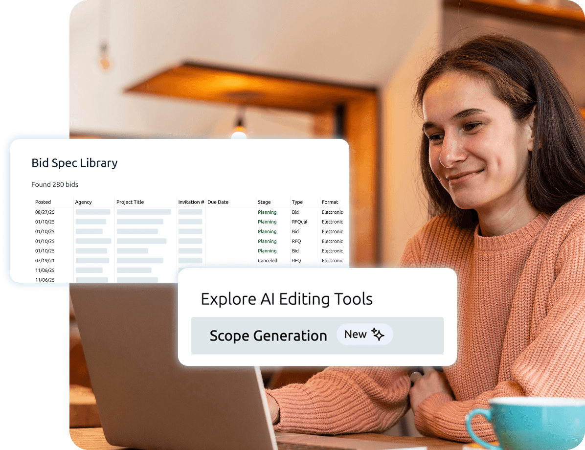 woman smiling in front of a laptop